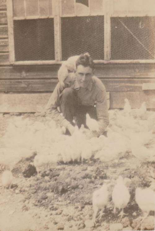 Southard on his farm in Red Hook with chicken. Circa 1922