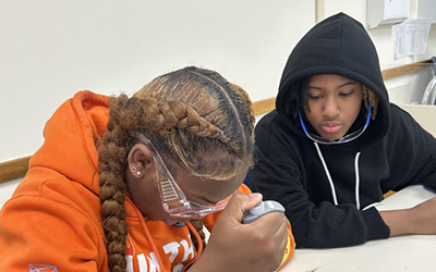 Students performing an experiment at Cold Spring Harbor Laboratory