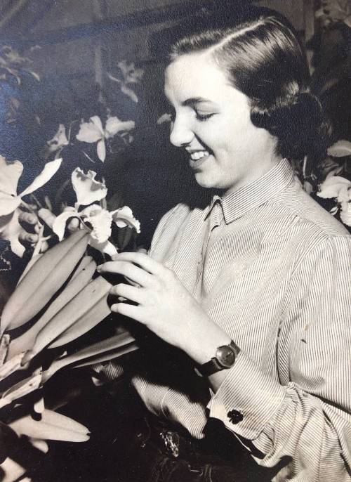 Claire with flowers circa 1955