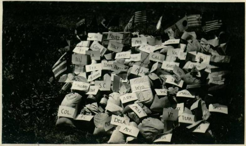 a photo of parcels containing soil from all the allied nations